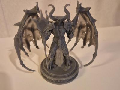Demon with staff
