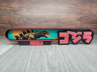 Godzilla movie logo sign