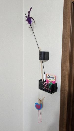 Cat toy wallmount holder