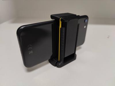 Phone holder for a tripod
