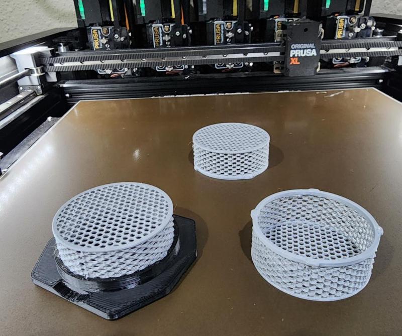 Desiccant cup for filament dry box with rollers