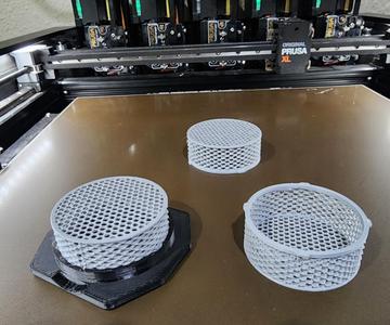 Desiccant cup for filament dry box with rollers