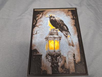Raven on Light post