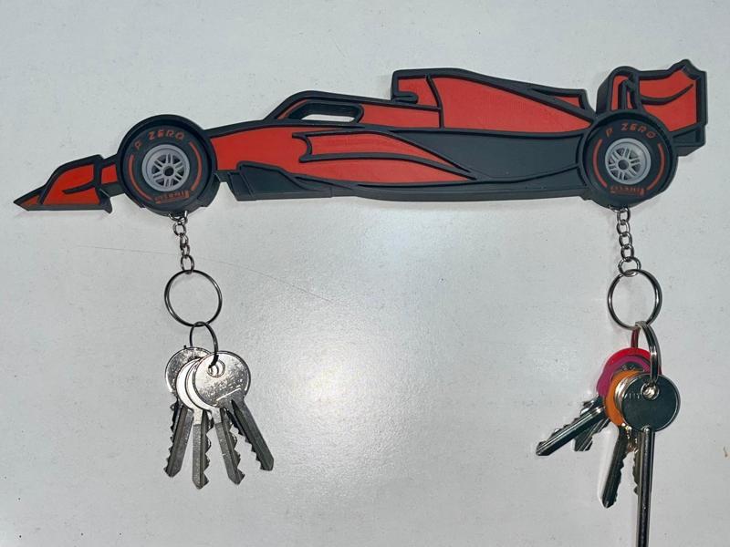Formula 1 silhouette wall mount + pirelli keychain