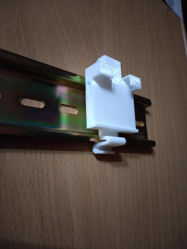 DIN rail mount for 3-way terminal block with levers