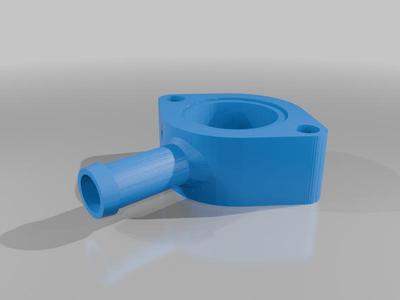 Miata Coolant reroute spacer.