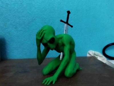 Dying Alien in Pain by Sword