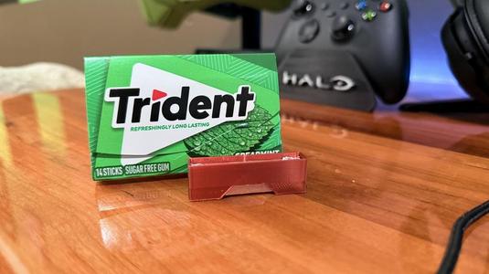 Trident dual gum holder