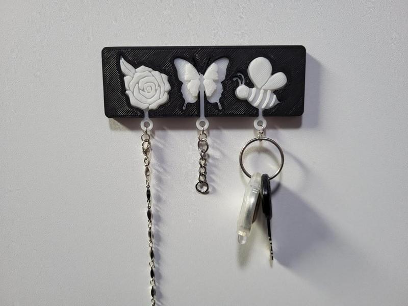 Wall-Mounted Keychain Holder with Flower, Butterfly, and Bee Keychains