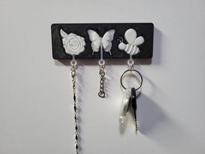 Wall-Mounted Keychain Holder with Flower, Butterfly, and Bee Keychains