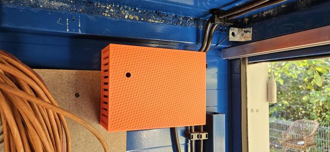 UPS housing for outdoor camera