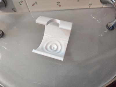 Electric toothbrush head holder
