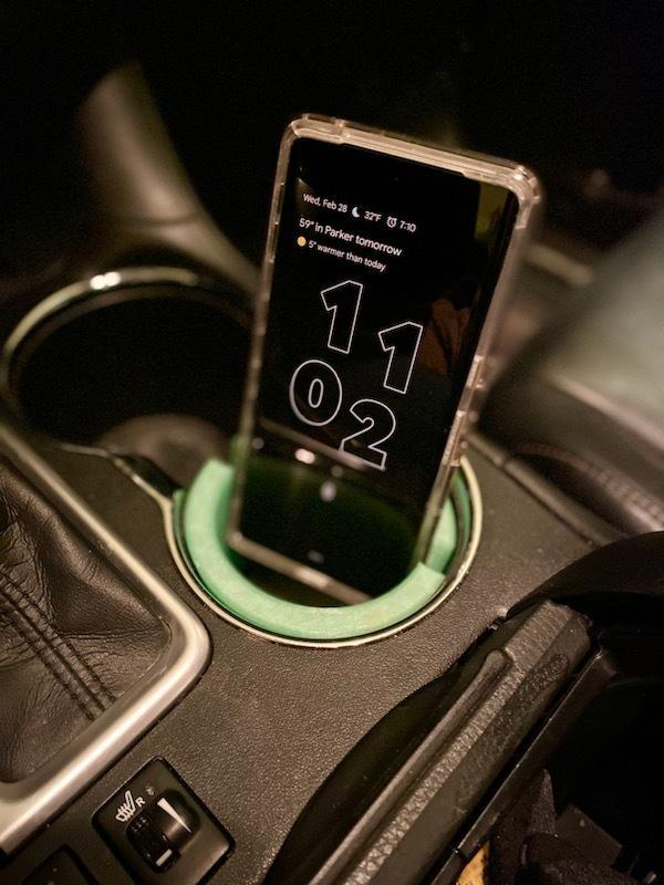 Cupholder insert and angled phone stand
