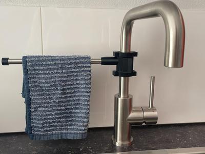 Dishcloth hanger for faucet