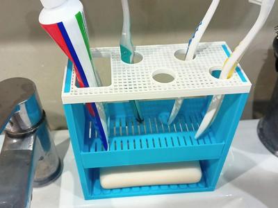 Toothbrush and soap dish holder