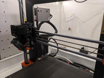 Mounting bracket for Cooler Master Pi Case 40 on Prusa MK3