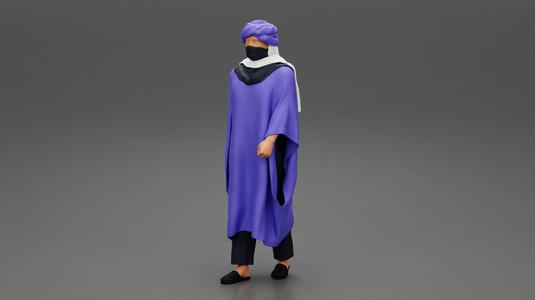 Blue  Arabic man of the sahara walking on Desert