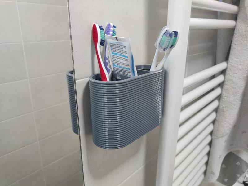 Toothbrush & toothpaste holder