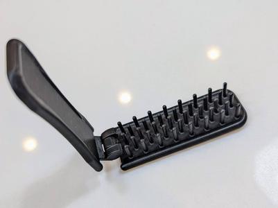 Compact foldable travel brush