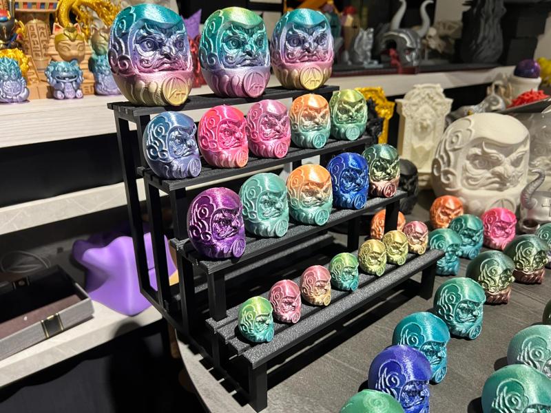 A 4-tier display shelf for figurines.