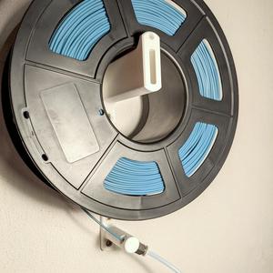 Wall mounted spool holder with PTFE edge and optional filament bowden guide