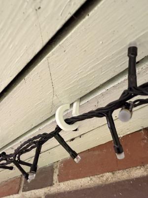 Hook for Christmas lights under roof overhang
