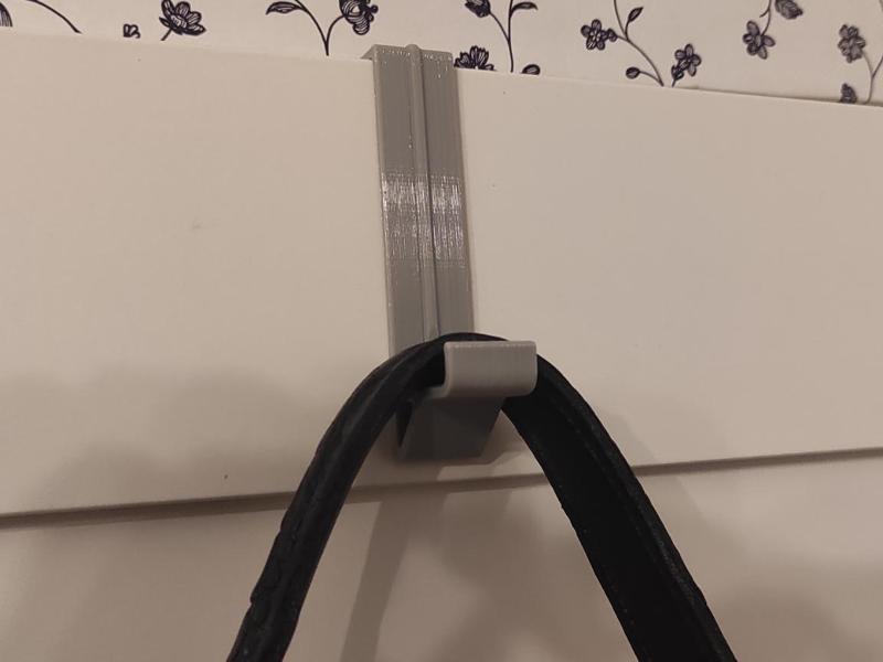 Hook for Ikea Pax wardrobe door. 