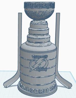 Tampa Bay Lighting Stanley cup with hockey sticks