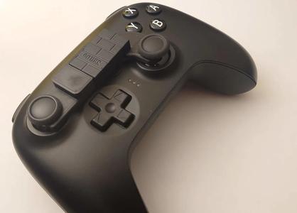 8BitDo Ultimate dongle holder on joysticks   