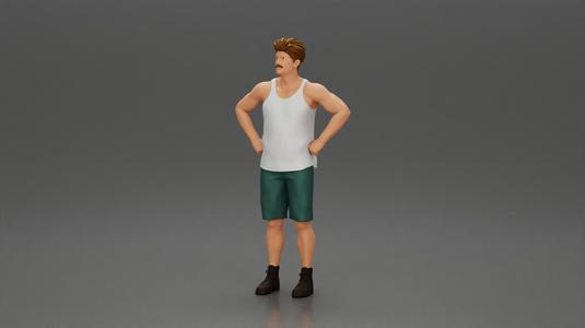 Man standing with his hands on his hips thinking and wondering