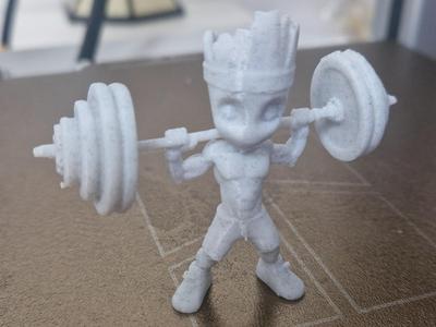 Groot with gym weight