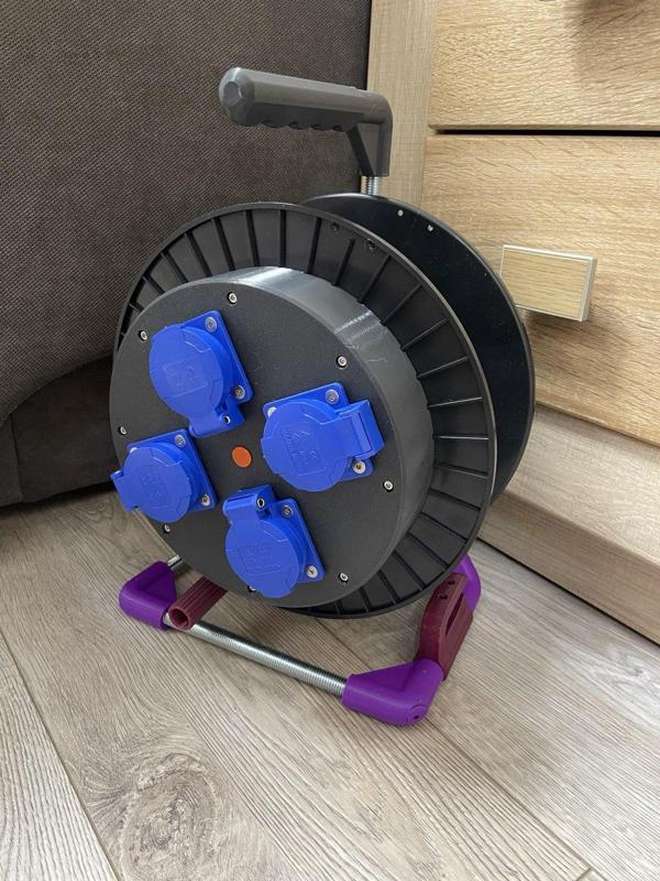 Network extension cable on a spool of 3D PLAST filament