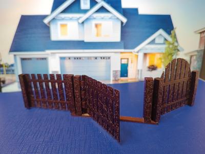 A fence for a doollhouse