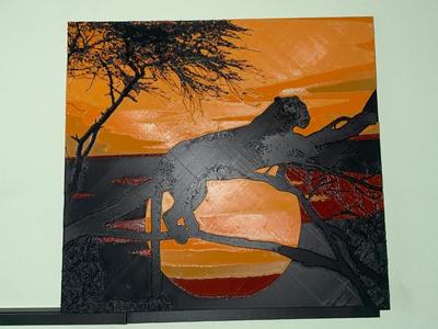 Leopard in a Tree at Sunset