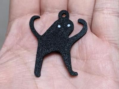 Cursed cat keyring (angry as fuk meme)