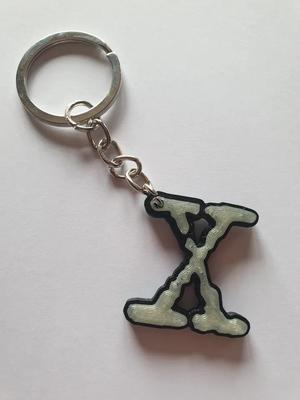 keychain with the x from the x-files   