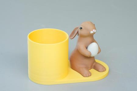Bunny rabbit with an egg