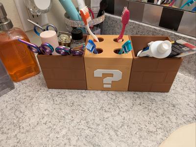 Mario block toothbrush holder and bathroom caddy