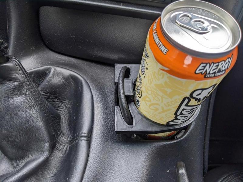 Improved Corvette C5 cupholder with locking tab