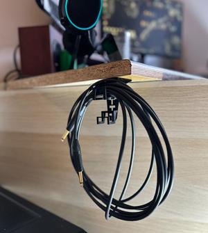 Desk cable hanger