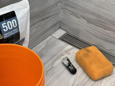 Corner grout float and caulking combination tool