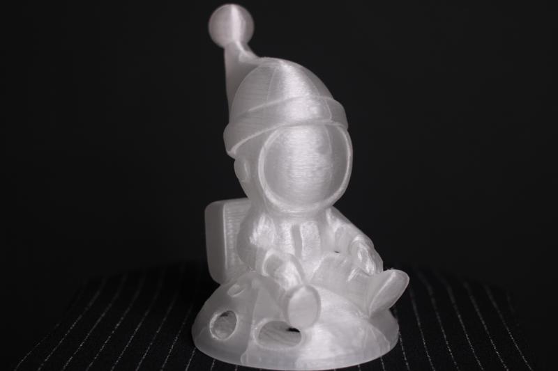 Buzz Sitting on Moon with Christmass Hat