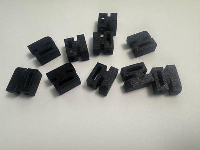 Lone Peak channel zip tie holders for bedrail track