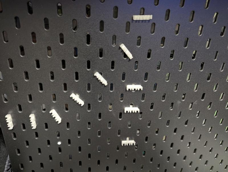 Cable holder for IKEA Skadis.