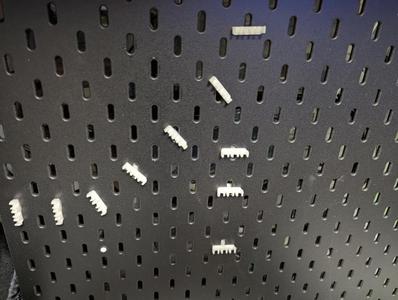 Cable holder for IKEA Skadis.