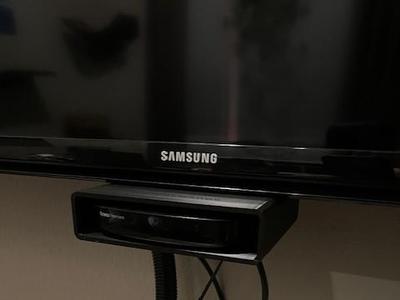 Roku Holder for Mounted TV