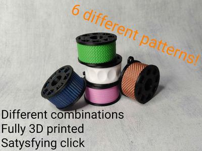 Clicky filament spool