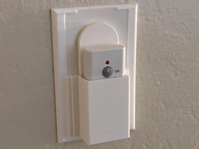 outlet cover remote holder