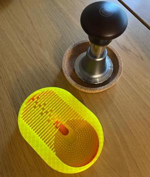 Spring-loaded temper scrubber