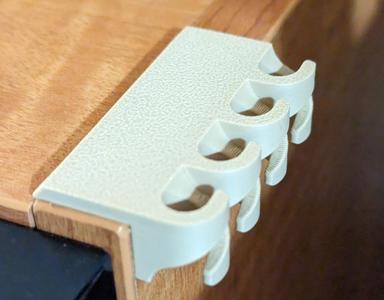 Cable holder with hanger